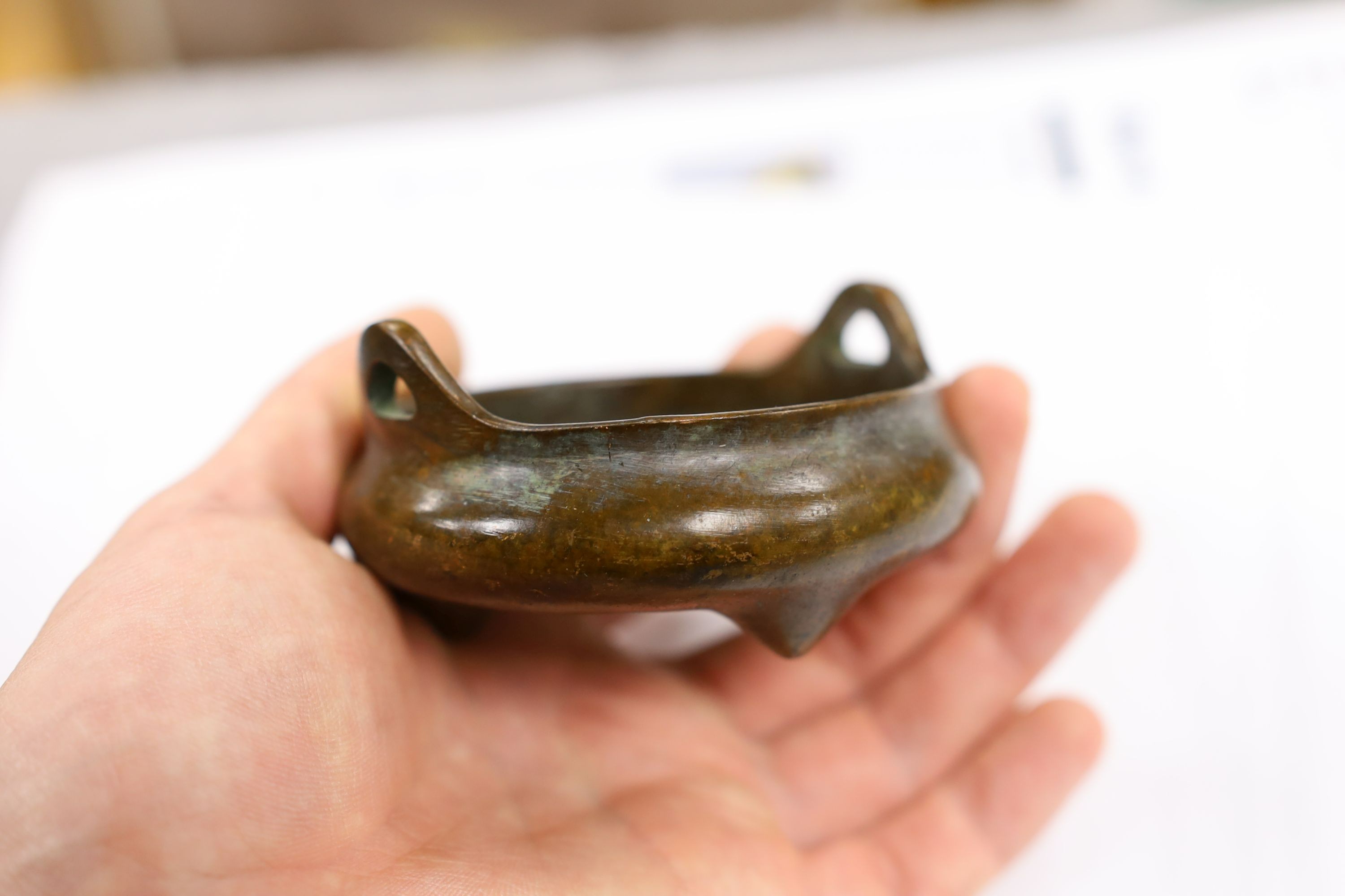 Two Chinese bronze censers, largest 11cms diameter